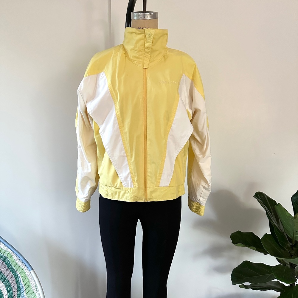 Unisex 1980's Adidas windbreaker, yellow and white, cotton, size small.